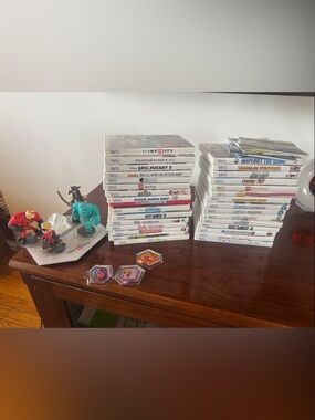 Nintendo Wii Games and Disney Infinity game board and characters